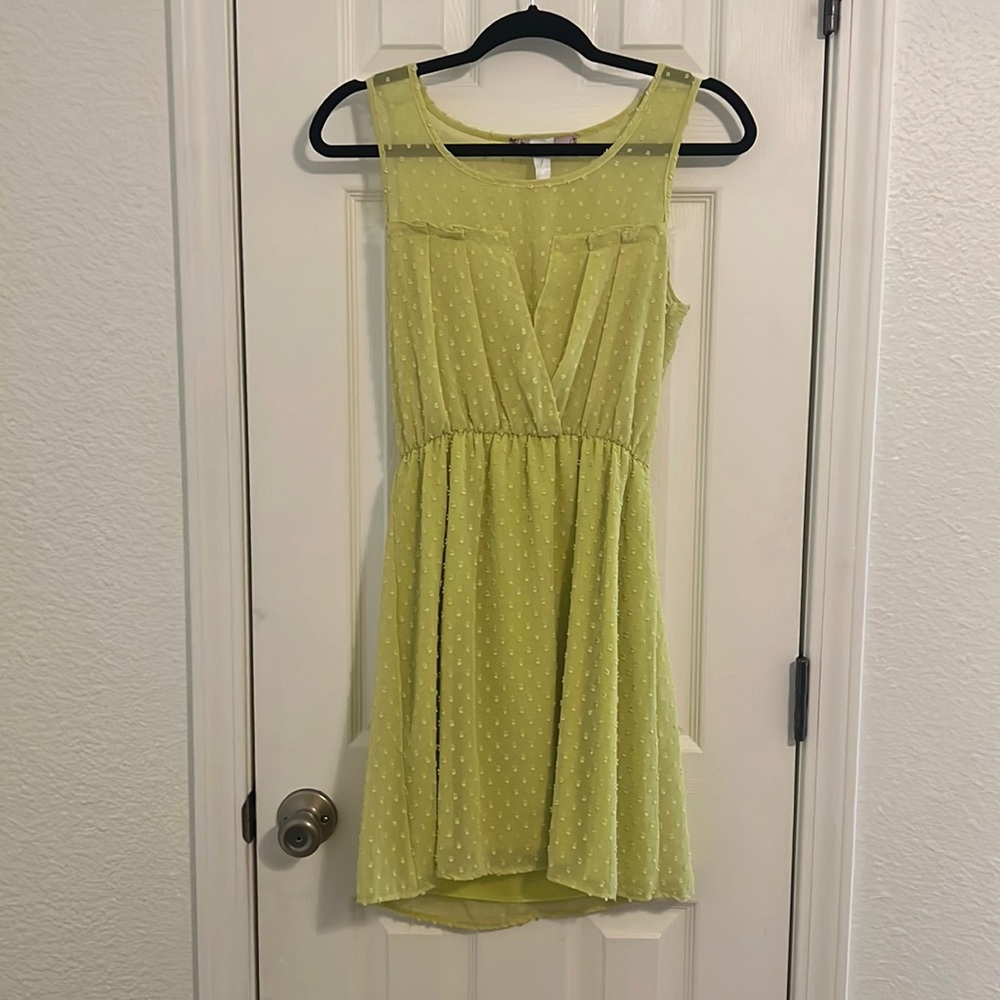 Small yellow/green dress. Used but in good condition.